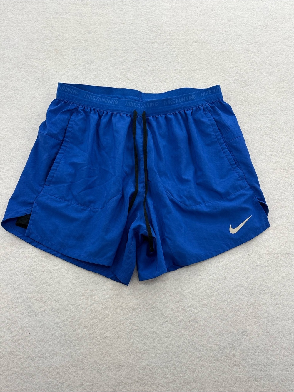 Men’s Nike Blue Running Shorts with White Swoosh size M